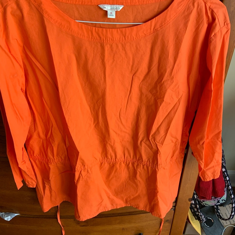 The gap orange shirt with tie back.  3/4” sleeves